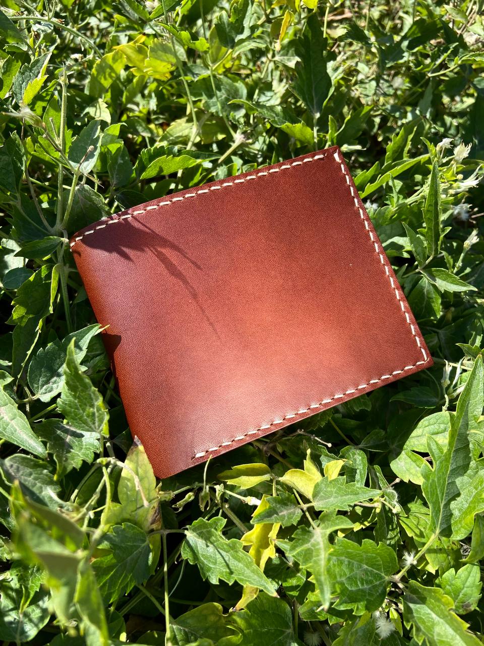 Bifold leather wallet made of Buttero vegetable tanned leather