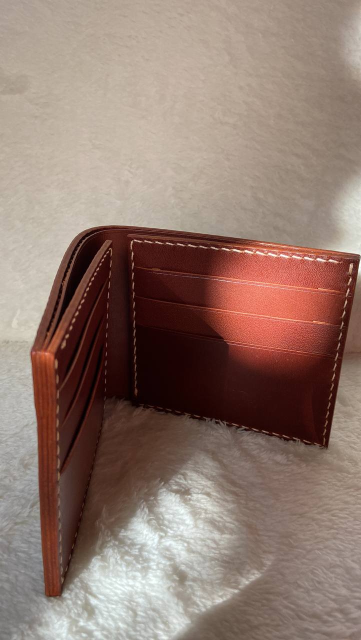 Bifold leather wallet made of Buttero vegetable tanned leather